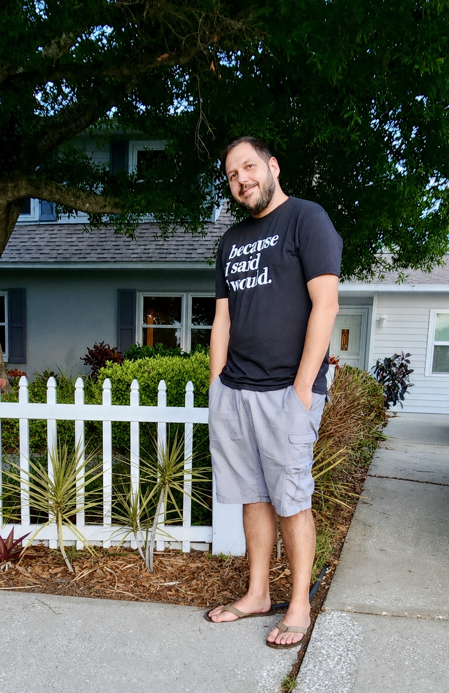 CJ standing in the front yard